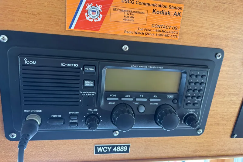 Slide: The Image of VHF marine radios on a 1998 Grand Banks 52 Europa yacht dashboard. - 36