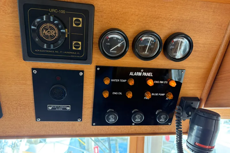 Slide: The Image of Icom IC-M710 marine transceiver on 1998 Grand Banks 52 Europa yacht dashboard. - 37