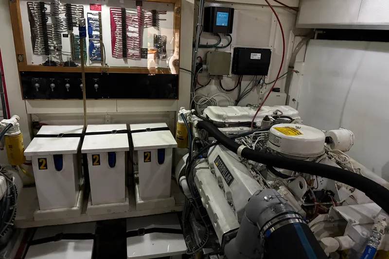 Slide: The Image of Engine room of a 1998 Grand Banks 52 Europa yacht with Caterpillar engine. - 49