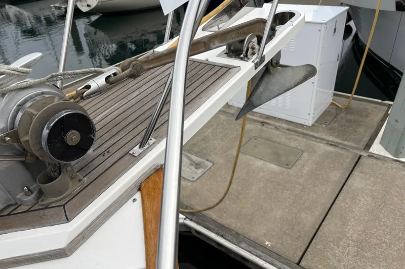 Slide: The Image of Helm of 1998 Grand Banks 52 Europa yacht with wooden wheel and navigation equipment. - 5