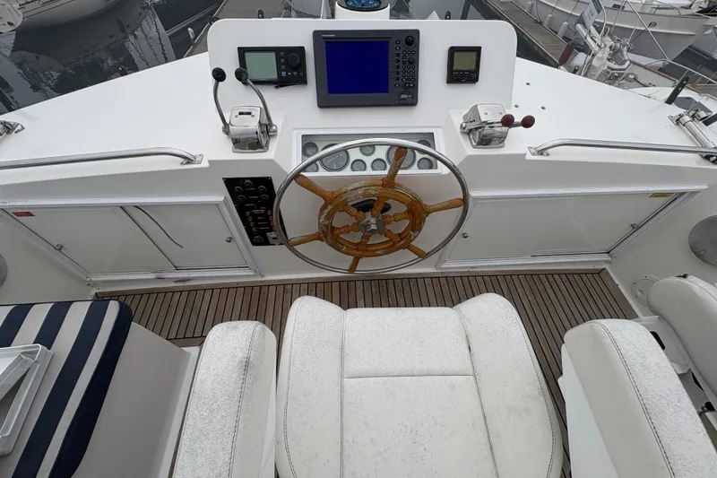 Slide: The Image of Inflatable boat with Tohatsu motor on 1998 Grand Banks 52 Europa yacht. - 8