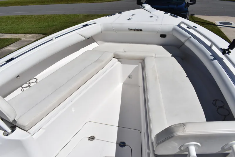 Slide: The Image of 2018 Everglades 273 Center Console boat with spacious seating and sleek design. - 22