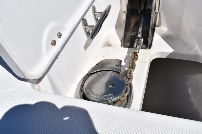 Slide: The Image of Anchor chain and winch on 2018 Everglades 273 Center Console boat deck. - 26