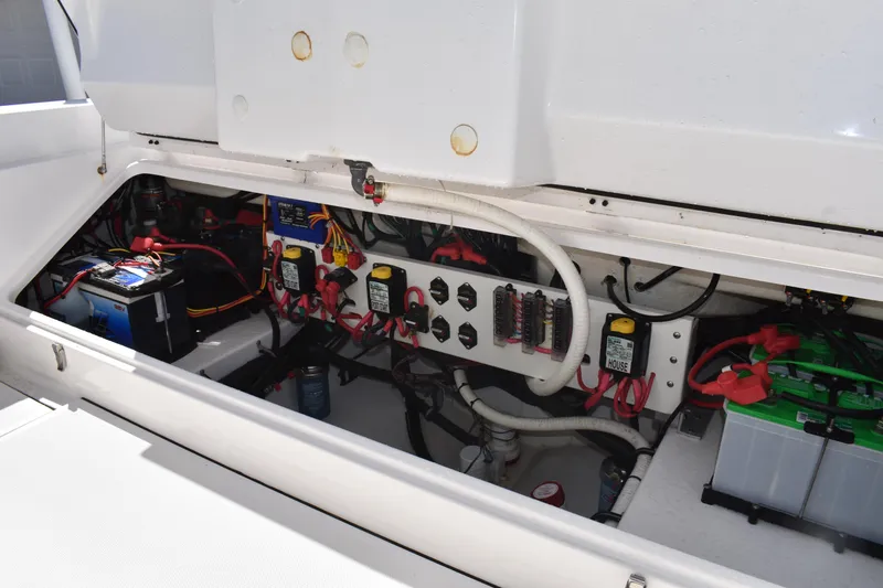 Slide: The Image of Electrical system of a 2018 Everglades 273 Center Console boat, showcasing wiring and batteries. - 32