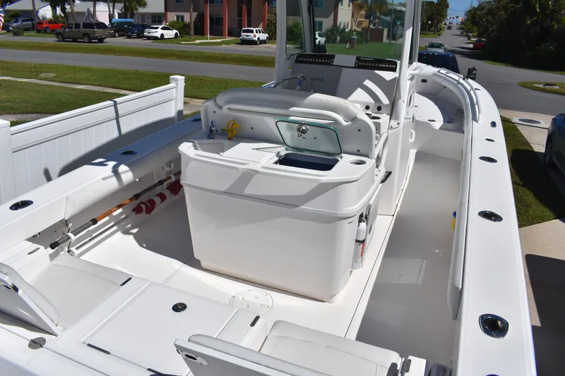 Slide: The Image of 2018 Everglades 273 Center Console boat with spacious deck and modern amenities. - 6