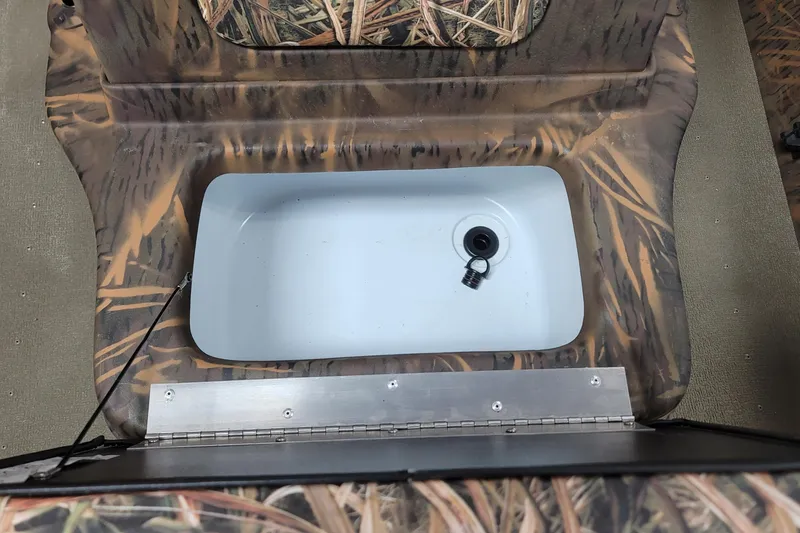 Slide: The Image of Camouflage interior of 2026 G3 17CC boat with built-in storage compartment. - 13