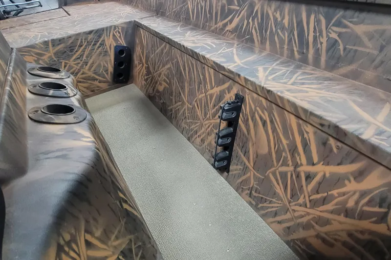 Slide: The Image of Interior of 2026 G3 17CC boat with camouflage design and rod holders. - 15