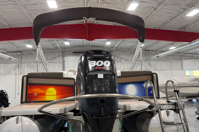 Slide: The Image of 2014 Premier 290 Grand Isle 10' Wide boat with 300 Pro Verado engine in a warehouse. - 5
