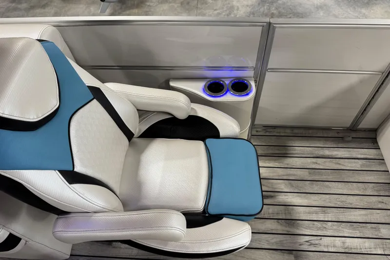 Slide: The Image of Luxurious seating on 2015 South Bay 925 Super Sport boat with cup holders and modern design. - 13