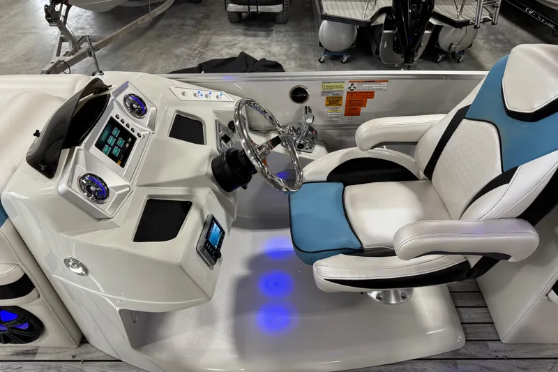 Slide: The Image of Captain's seat and control panel of 2015 South Bay 925 Super Sport boat. - 16