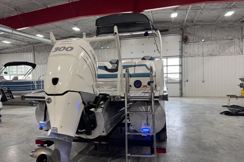 Slide: The Image of 2015 South Bay 925 Super Sport boat with Mercury 300 engine in a showroom. - 18