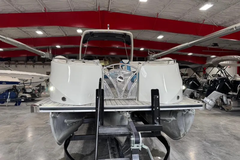 Slide: The Image of 2015 South Bay 925 Super Sport pontoon boat on trailer in indoor storage facility. - 6