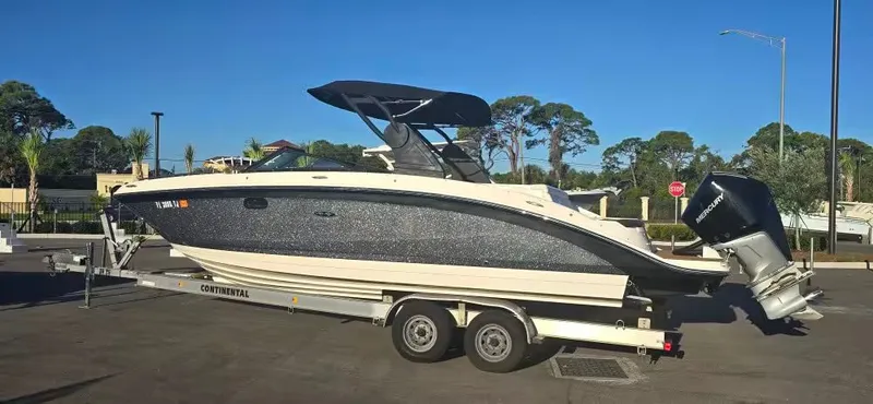 The Image of 2018 Sea Ray SDX 270 Outboard on trailer, sunny day. - 1