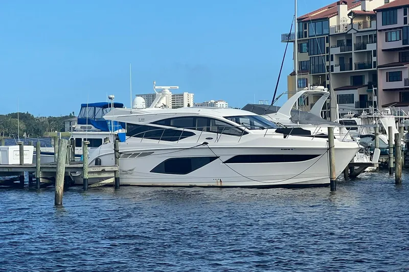Slide: The Image of 2019 Sea Ray L550 yacht on open sea. - 1