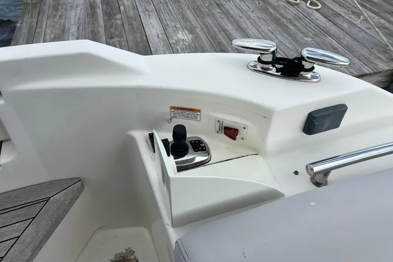 Slide: The Image of 2019 Sea Ray L550 yacht with Raymarine and TracVision HD7 equipment under cloudy sky. - 11