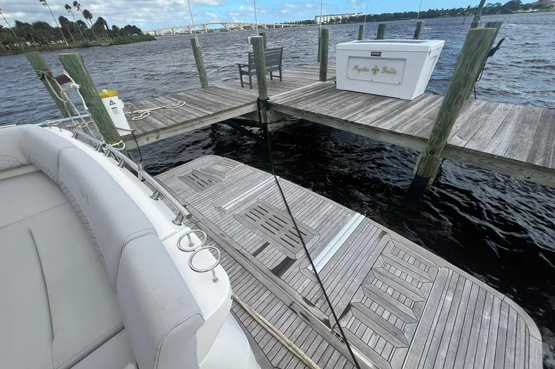 Slide: The Image of 2019 Sea Ray L550 yacht with HD7 satellite dome against clear blue sky. - 12