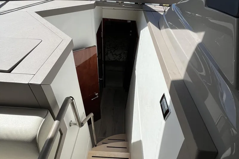 Slide: The Image of 2019 Sea Ray L550 yacht interior view with navigation equipment and waterway. - 27