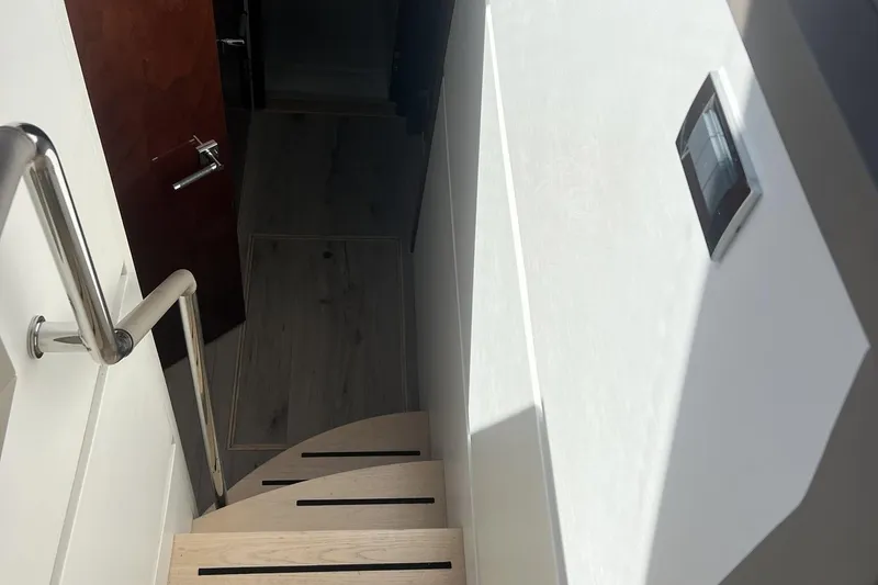 Slide: The Image of Interior view of 2019 Sea Ray L550 yacht with panoramic windows and sleek design. - 28