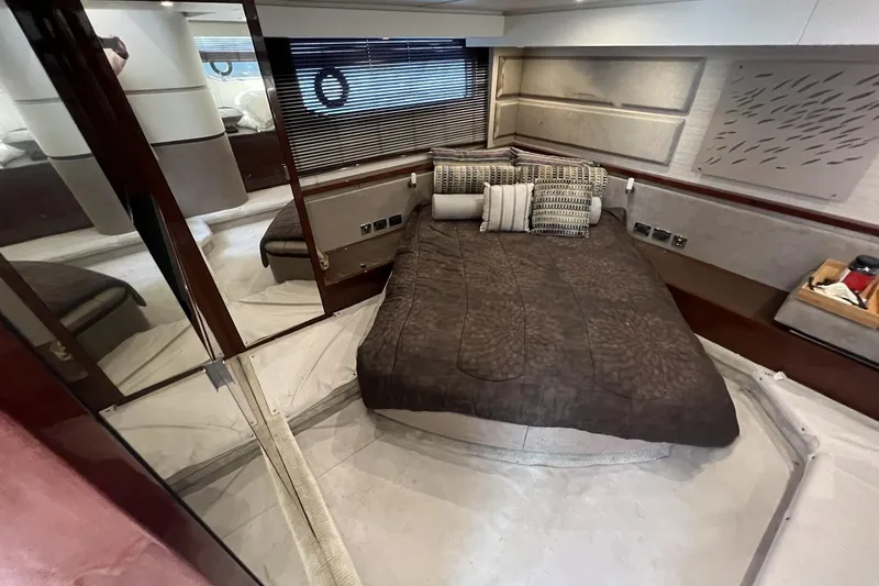 Slide: The Image of Dashboard of a 2019 Sea Ray L550 yacht with navigation and control displays. - 36