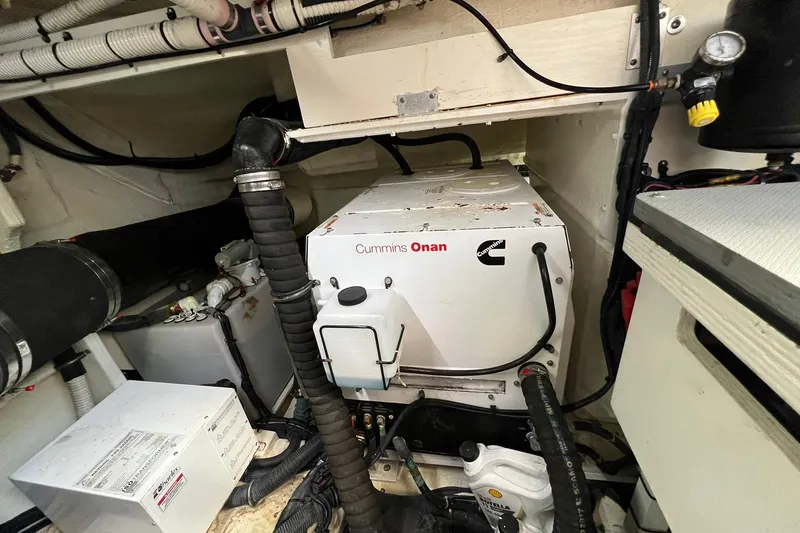 Slide: The Image of Luxurious interior of 2019 Sea Ray L550 yacht with modern kitchen and seating area. - 43