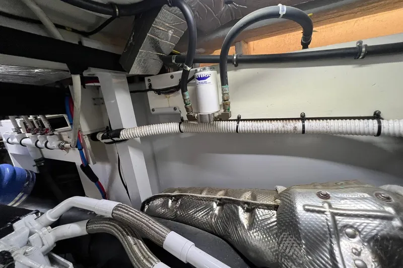 Slide: The Image of Luxurious 2019 Sea Ray L550 yacht interior with elegant bedroom and modern amenities. - 62