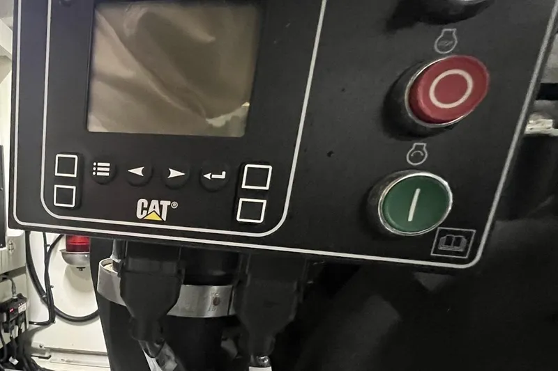 Slide: The Image of Luxurious interior of 2019 Sea Ray L550 yacht with sleek TV and wood paneling. - 63