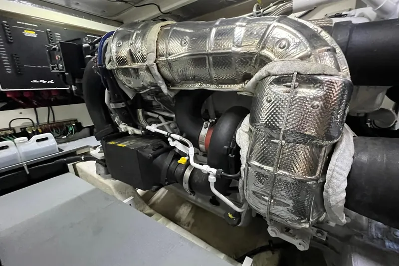 Slide: The Image of Luxurious bathroom interior of 2019 Sea Ray L550 yacht with modern fixtures and wooden accents. - 67