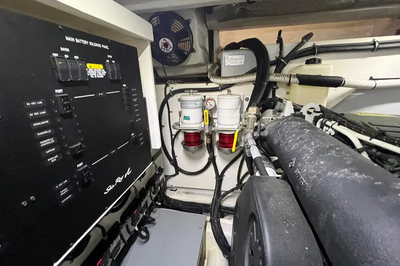 Slide: The Image of 2019 Sea Ray L550 yacht interior hallway with modern design and cozy bedroom. - 69