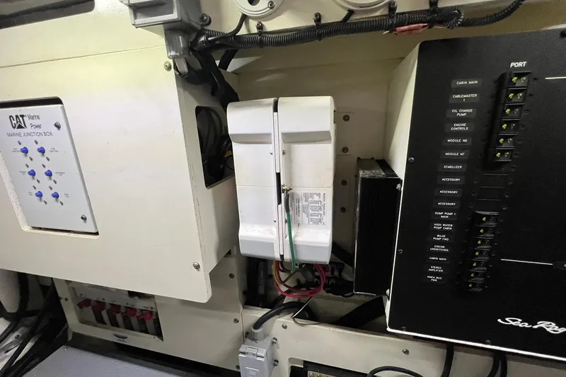 Slide: The Image of Interior of 2019 Sea Ray L550 yacht with mounted TV and control panels. - 71