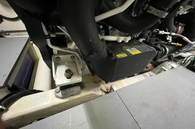 Slide: The Image of Luxurious 2019 Sea Ray L550 yacht bedroom with elegant bedding and modern design. - 77