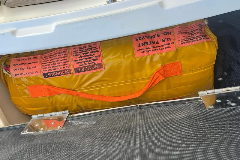 Slide: The Image of Luxurious interior of 2019 Sea Ray L550 yacht featuring elegant wood finishes and modern amenities. - 79