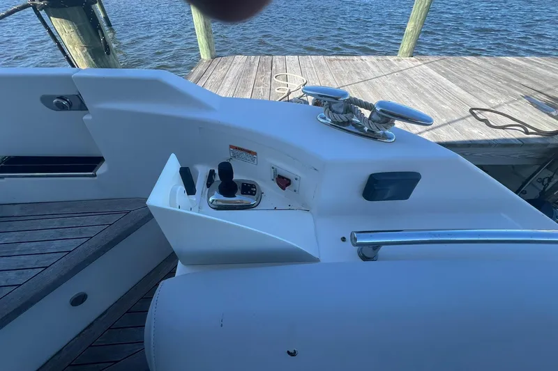 Slide: The Image of Engine room of 2019 Sea Ray L550 yacht, showcasing complex machinery and components. - 83