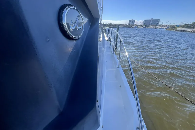 Slide: The Image of Engine room of 2019 Sea Ray L550 with Cummins Onan generator. - 84