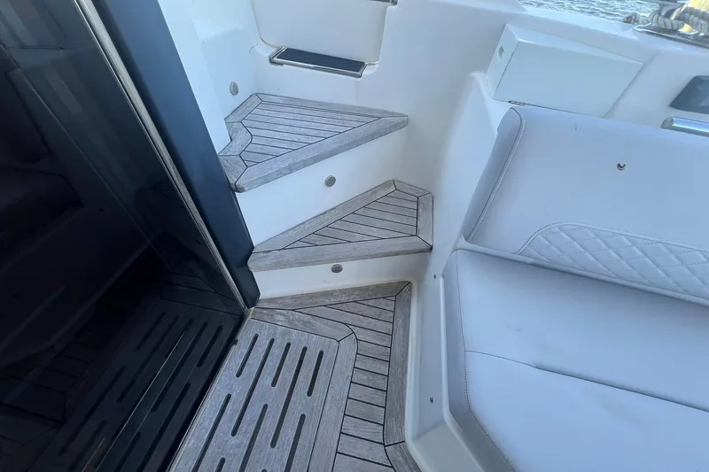 Slide: The Image of Engine room of 2019 Sea Ray L550 yacht with Cummins Onan generator and various components. - 85