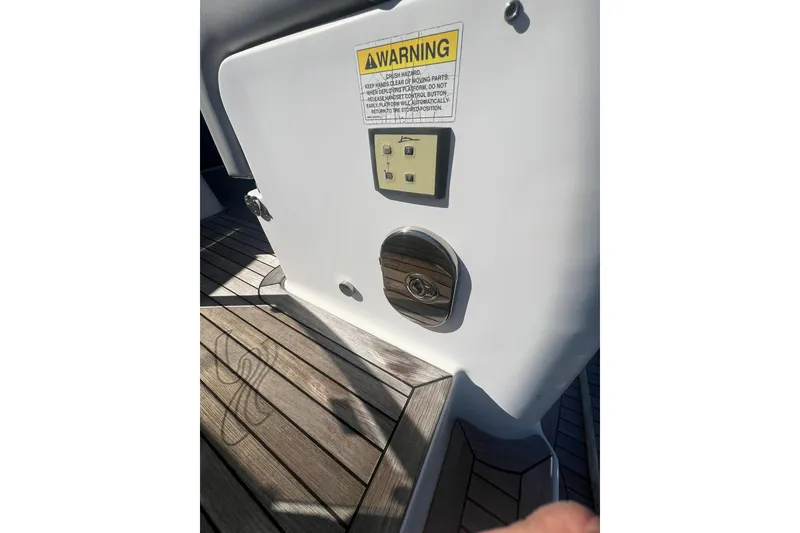 Slide: The Image of Engine room of 2019 Sea Ray L550 yacht with visible pipes and equipment. - 86