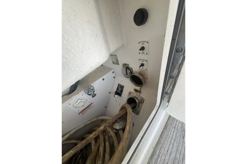 Slide: The Image of Engine room of 2019 Sea Ray L550 yacht, showcasing dual engines and mechanical systems. - 87