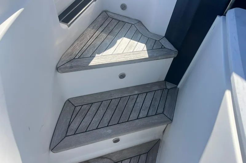 Slide: The Image of Engine room of 2019 Sea Ray L550 yacht with fire extinguisher and equipment. - 90