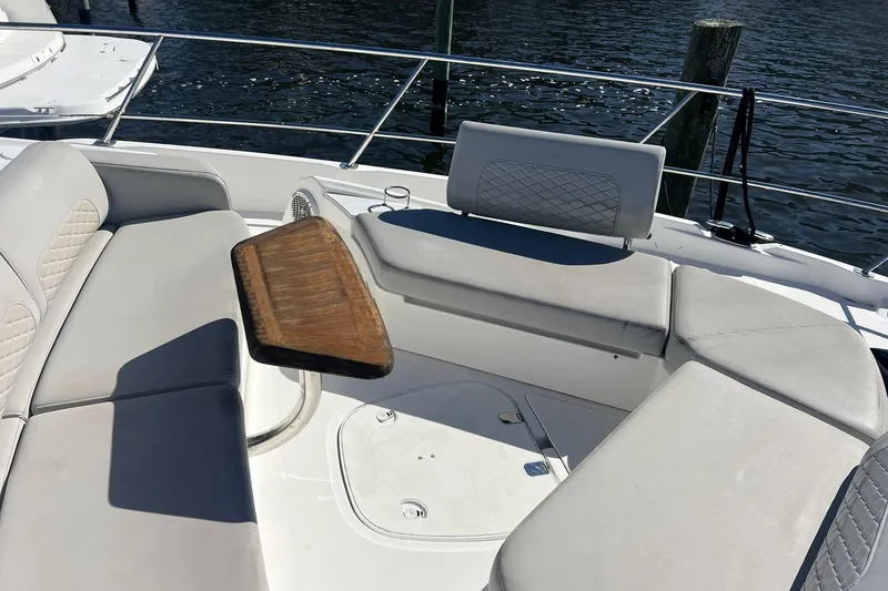 Slide: The Image of Engine room of 2019 Sea Ray L550 yacht with control panel and machinery. - 97