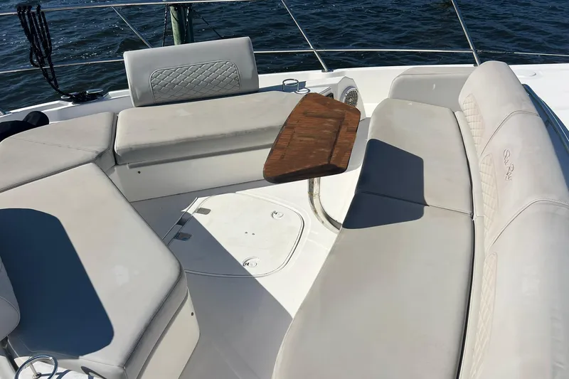 Slide: The Image of Main DC breaker panel of 2019 Sea Ray L550 yacht, featuring various control switches. - 98