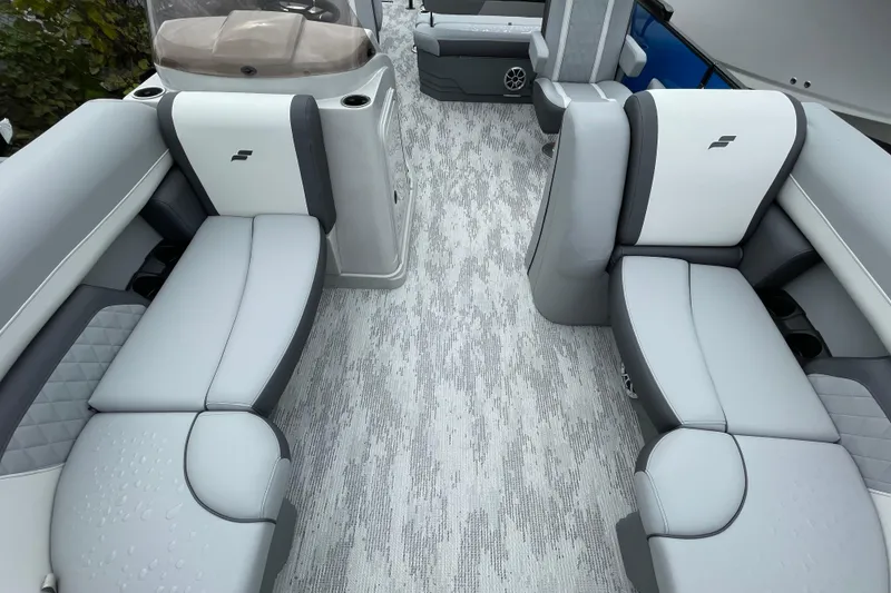 Slide: The Image of 2026 Starcraft EXS 3 DL boat interior with gray seating and modern design. - 3