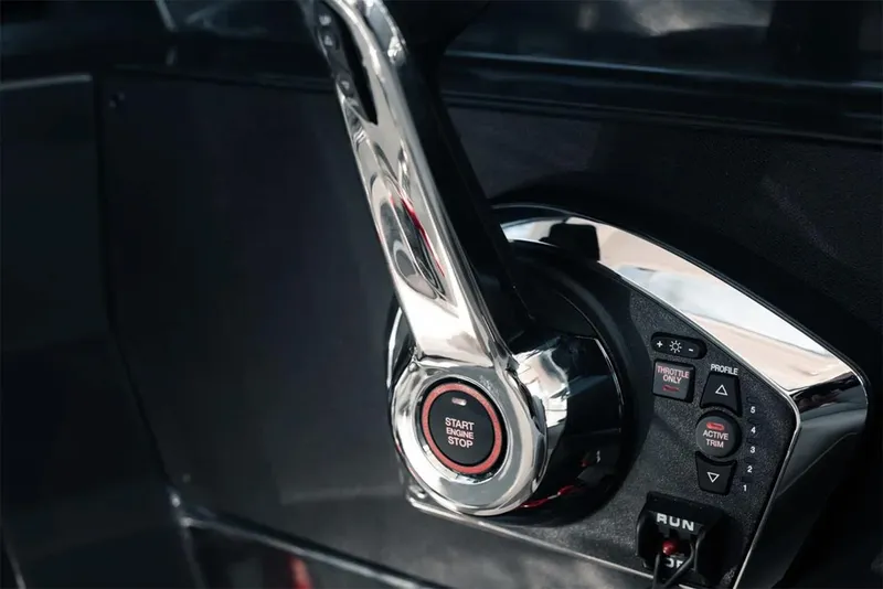 Slide: The Image of Manufacturer Provided Image: 2025 Bayliner Trophy T23 Explorer throttle control with start/stop button and control panel. - 4