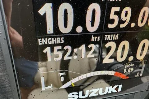 Slide: The Image of Close-up of Suzuki engine display on 2021 Bentley Pontoons 220 Elite Admiral. - 6