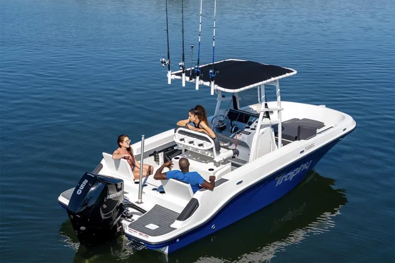 Slide: The Image of Manufacturer Provided Image: 2025 Bayliner Trophy T22CC boat with people relaxing on calm water. - 4