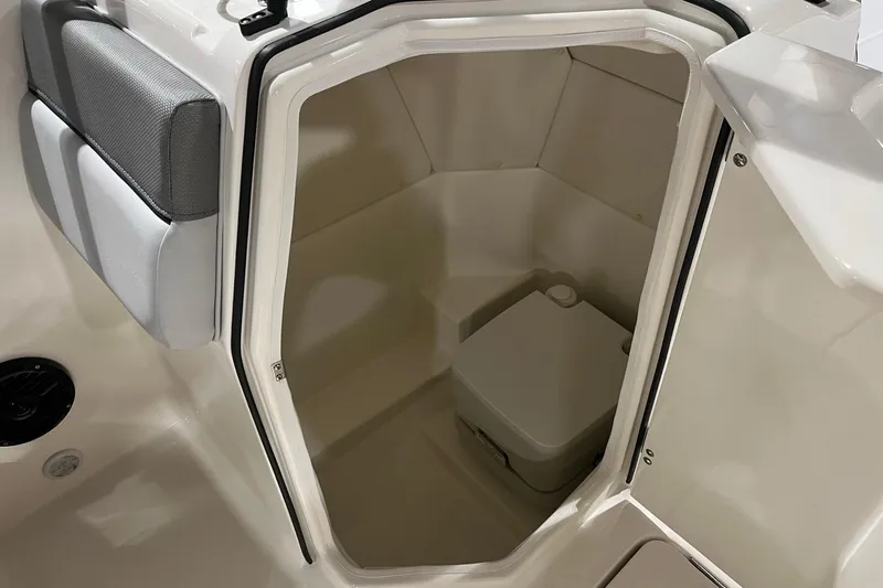 Slide: The Image of 2026 Bayliner D22 boat interior with compact toilet compartment. - 12