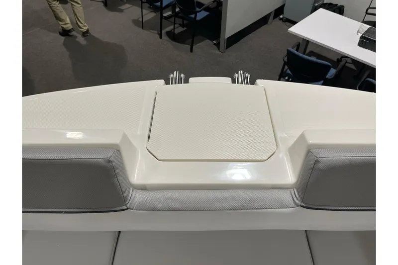 Slide: The Image of 2026 Bayliner D22 boat interior with cushioned seating and sleek design. - 14