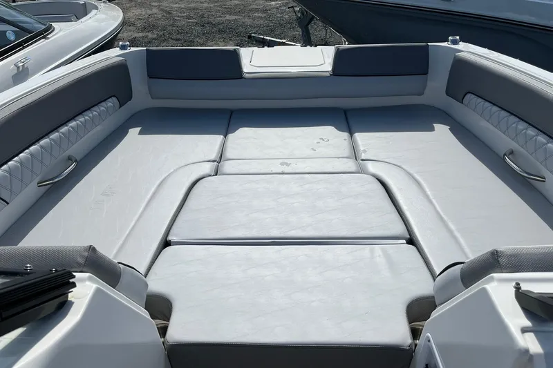 Slide: The Image of 2026 Bayliner D22 boat interior with spacious seating and modern design. - 16