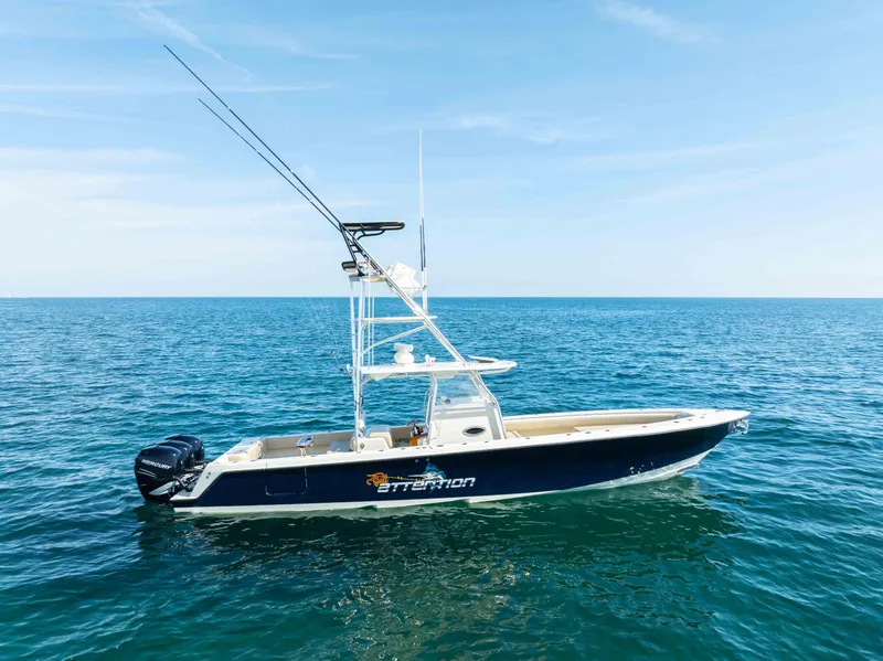 Slide: The Image of 2012 Contender 39 ST boat on open sea under clear blue sky. - 3