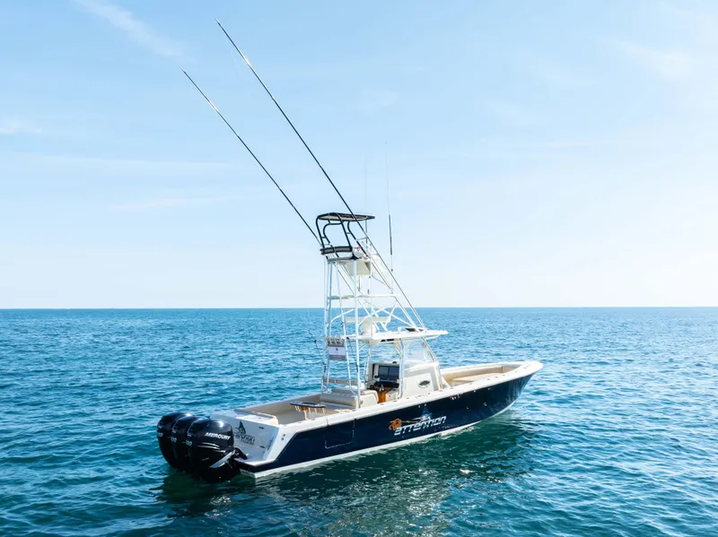 Slide: The Image of 2012 Contender 39 ST boat on open sea with clear blue sky. - 5