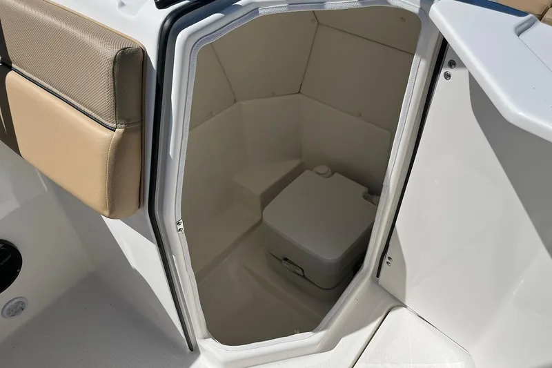 Slide: The Image of 2026 Bayliner D22 boat interior with compact marine toilet. - 12