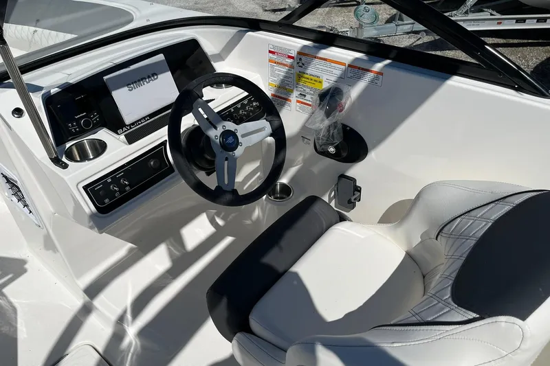 Slide: The Image of Interior view of Bayliner D22 boat, model year 2026. - 10